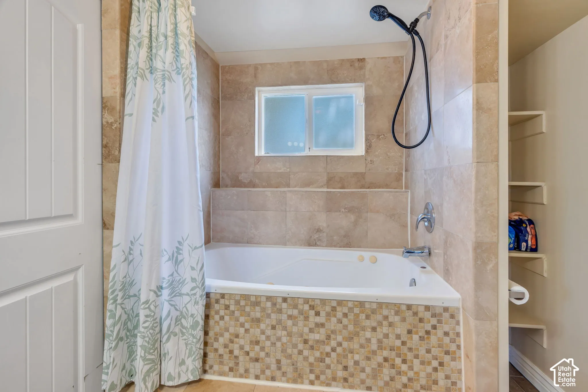 Updated bathroom with convenient access from the downstairs bedroom and adjoining living area.