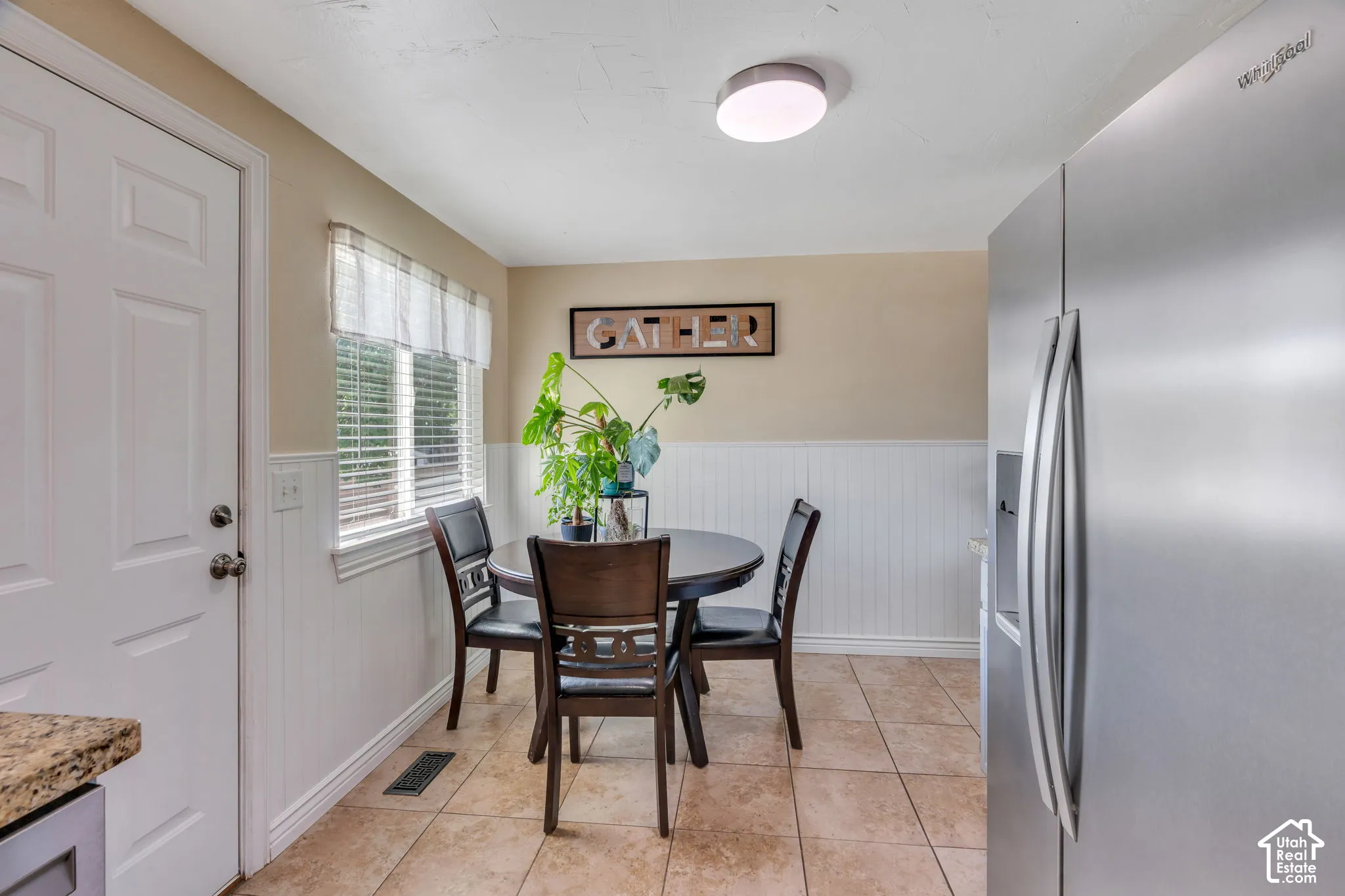 Charming eat-in dining nook creates a cozy spot for everyday meals.