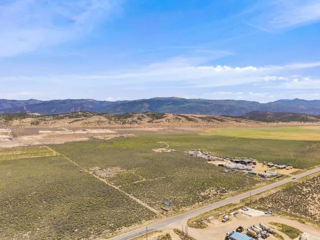 Expansive open landscape with distant mountain ranges