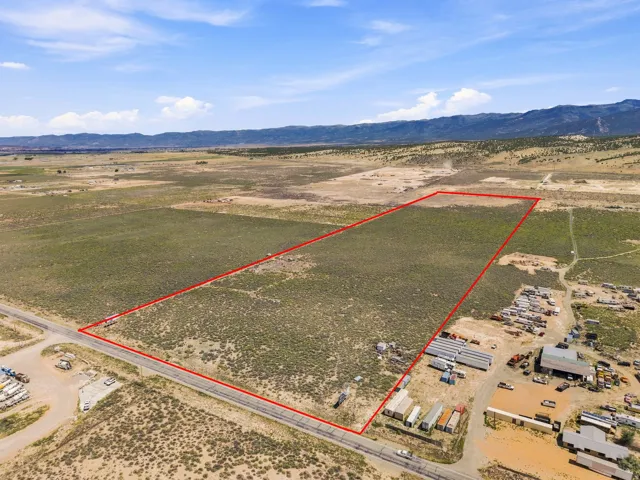 Expansive undeveloped land with a distant mountain backdrop