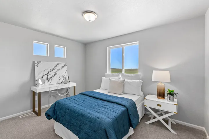Recessed ceiling light, two transom windows, large window, and light gray wall finish