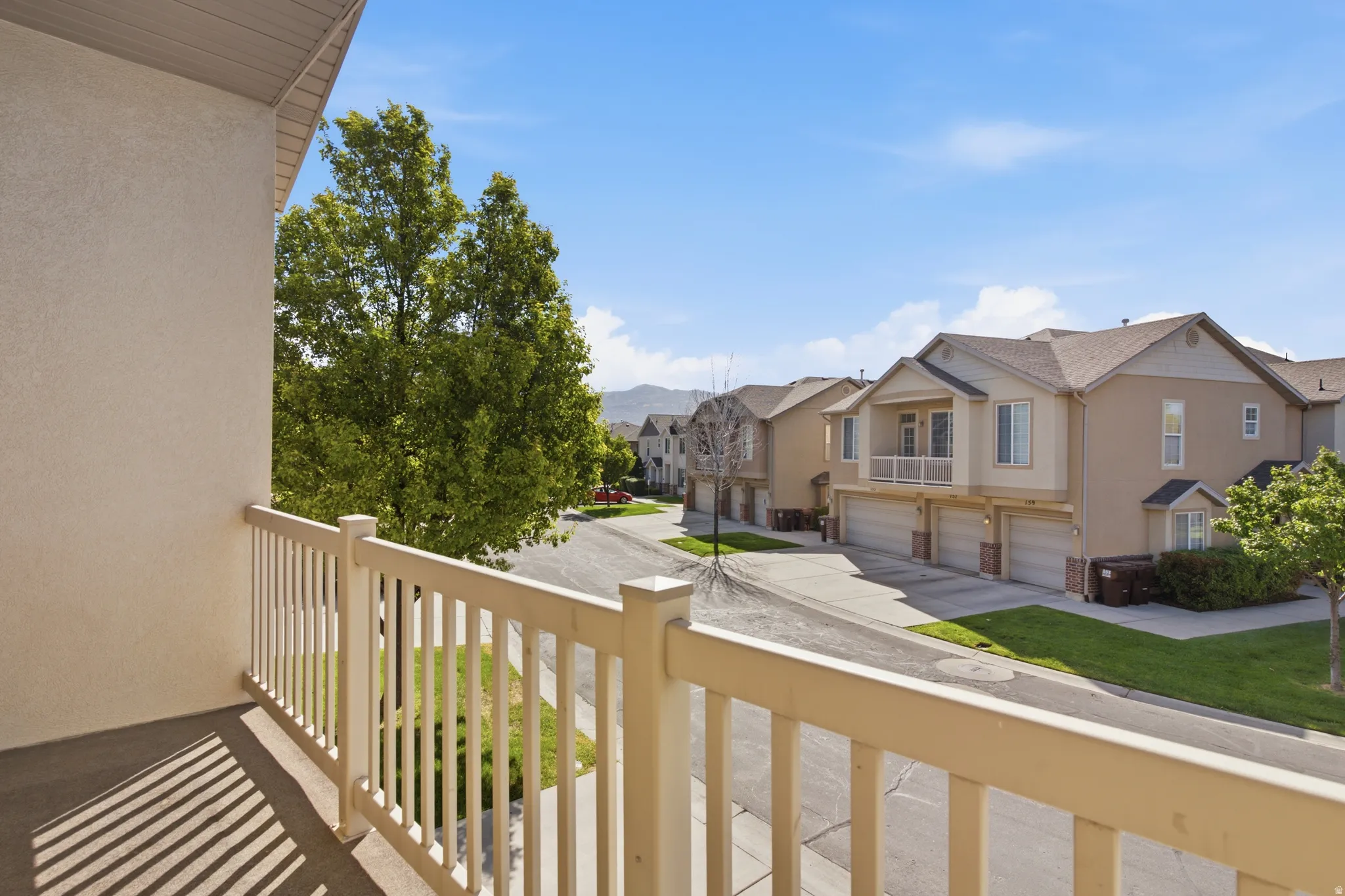 Exterior balcony with white railing