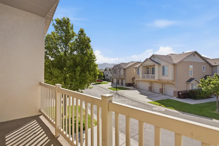 Exterior balcony with white railing