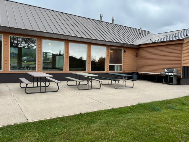 Expansive concrete patio with direct building access