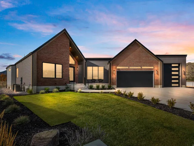 Contemporary exterior with brick and horizontal siding accents