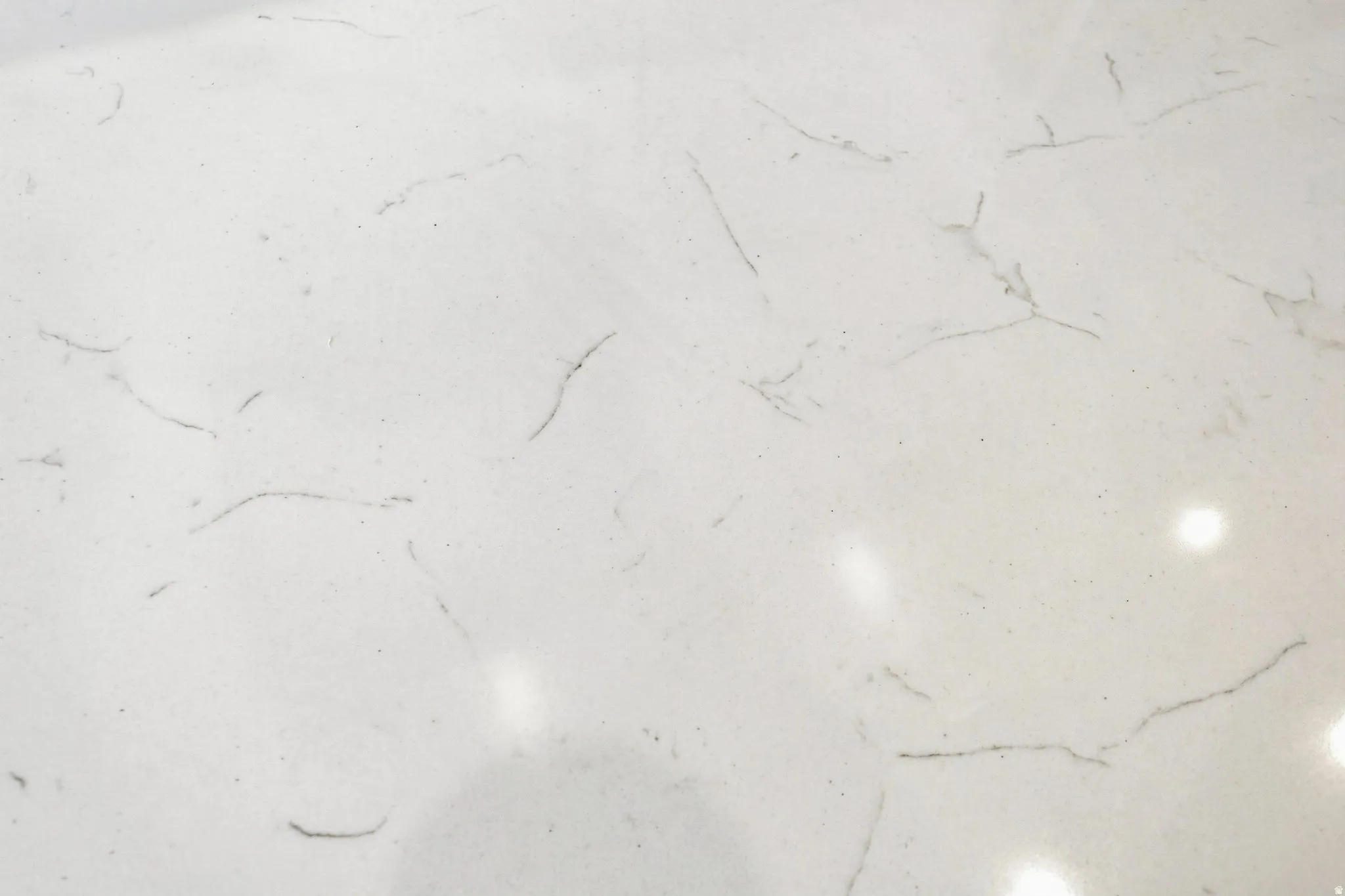White countertop with subtle gray veining
