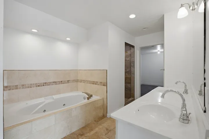 Dual vanity with undermount sinks and chrome fixtures