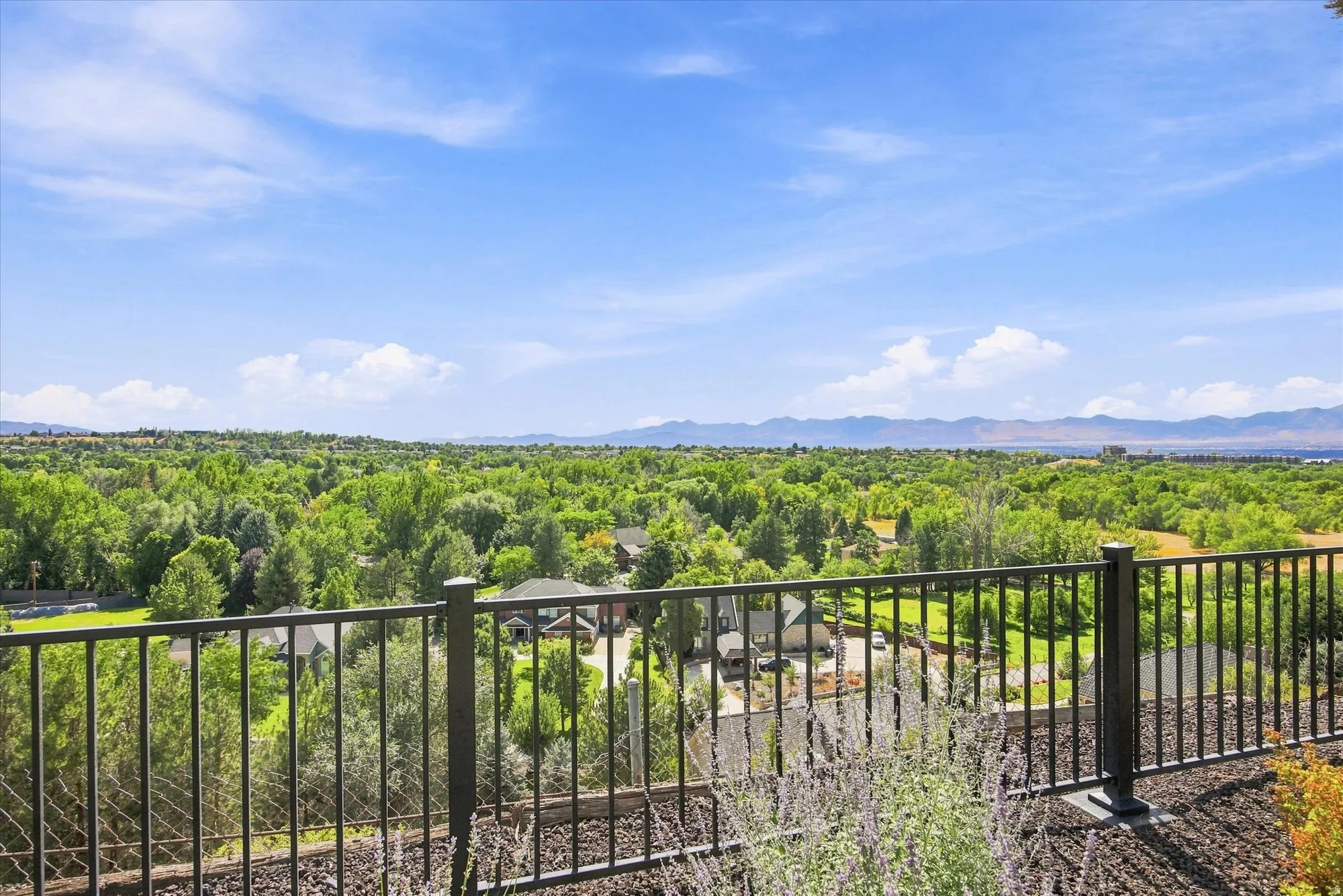 Expansive landscape with a horizon of distant mountains