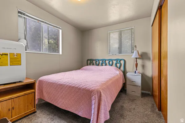 Wall-to-wall carpeting and neutral wall tones