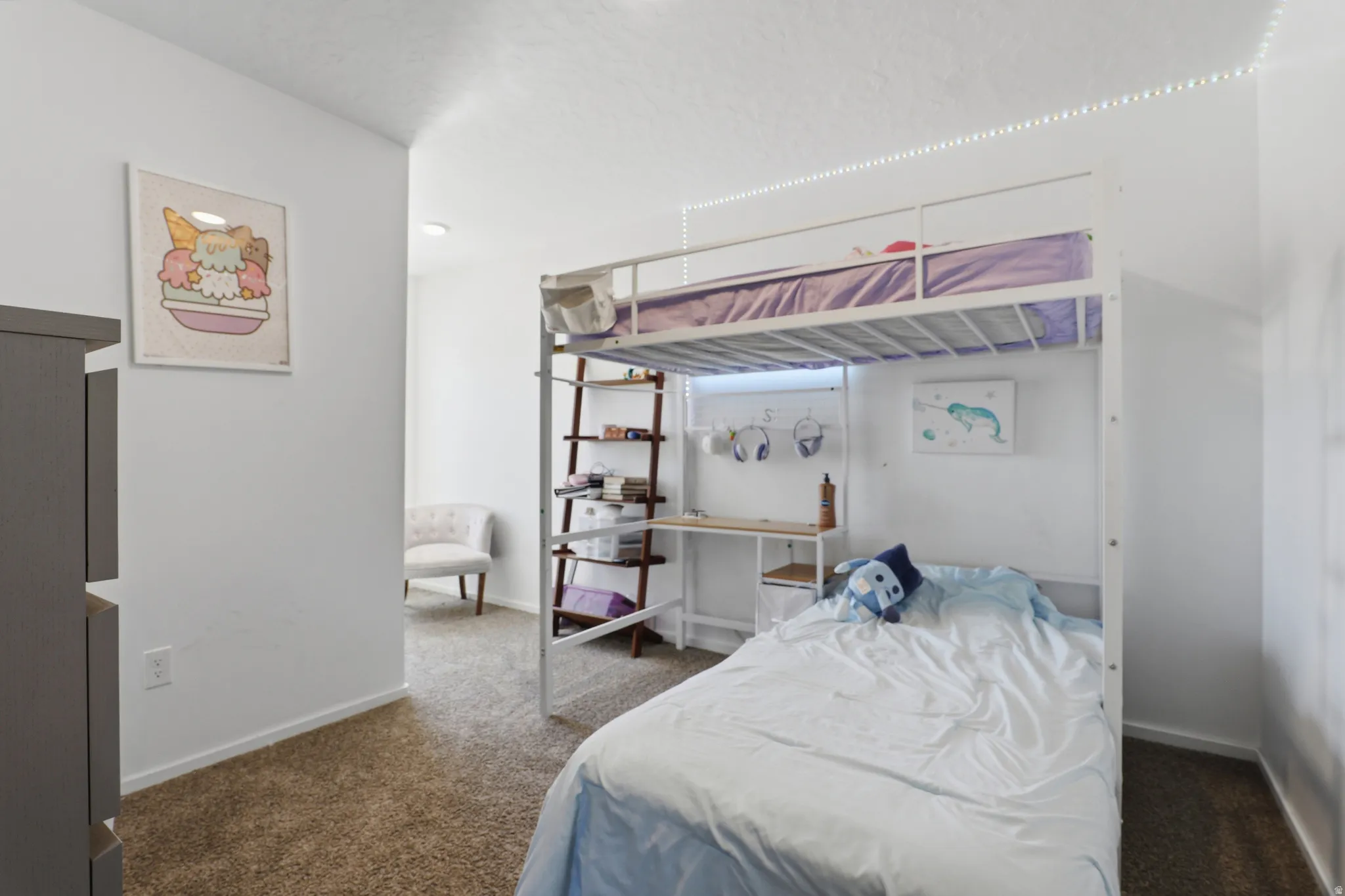 Carpeted flooring with white wall finishes