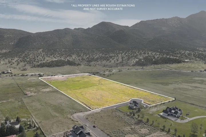 Expansive undeveloped parcel featuring open terrain and distant mountain scenery