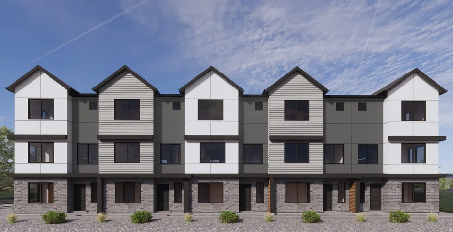 Modern townhome exterior with mixed material facade, dark framed windows, and pitched rooflines