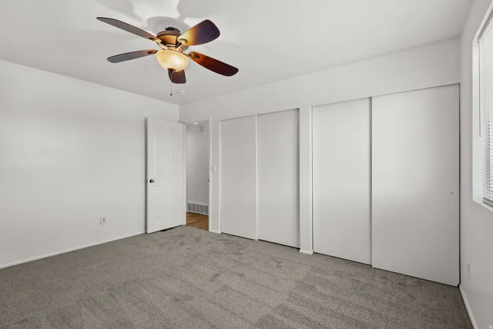Neutral-toned carpeting throughout