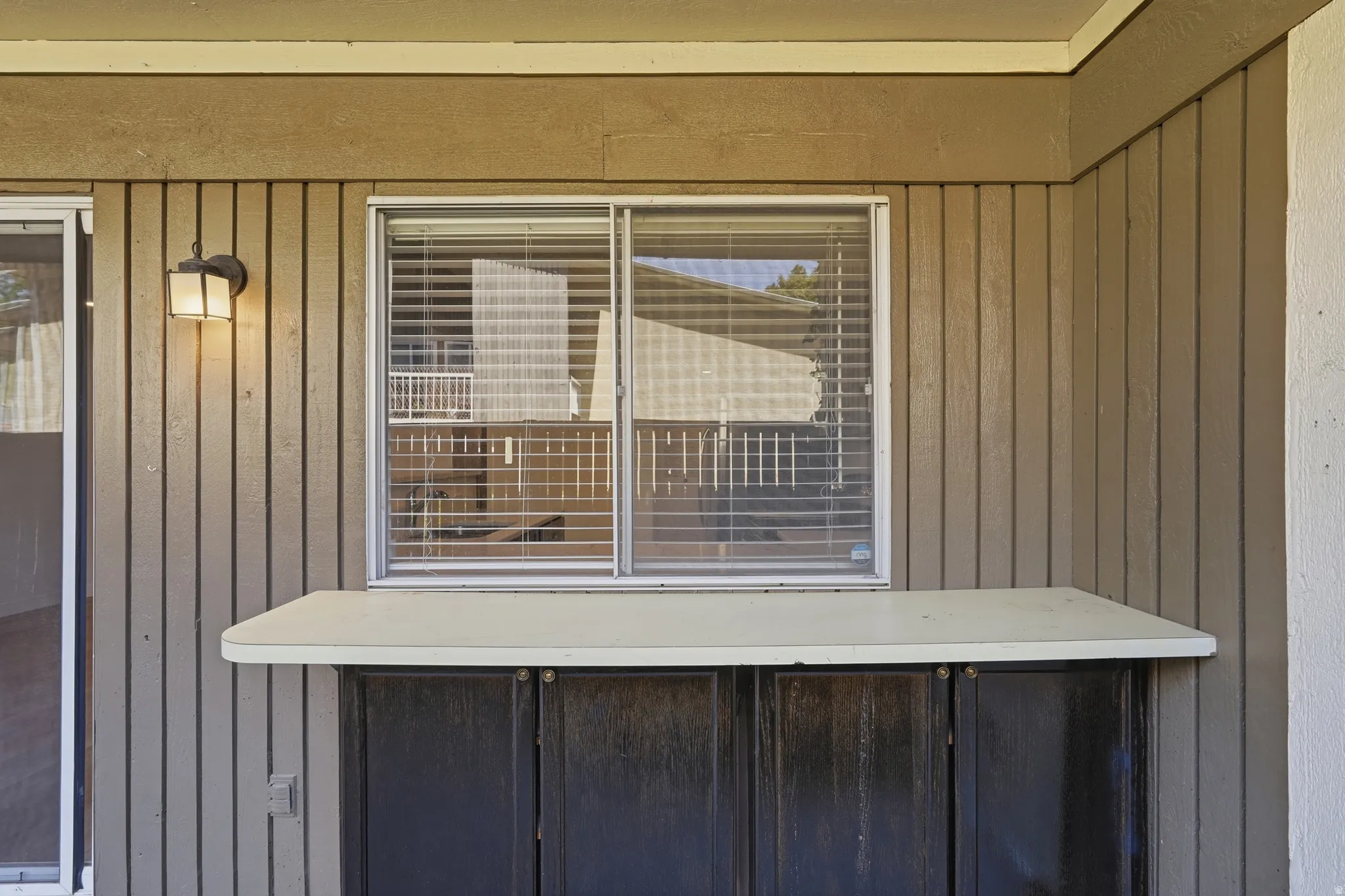 Exterior built-in counter with cabinet storage