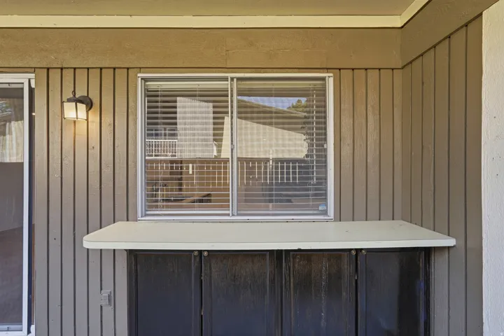 Exterior built-in counter with cabinet storage