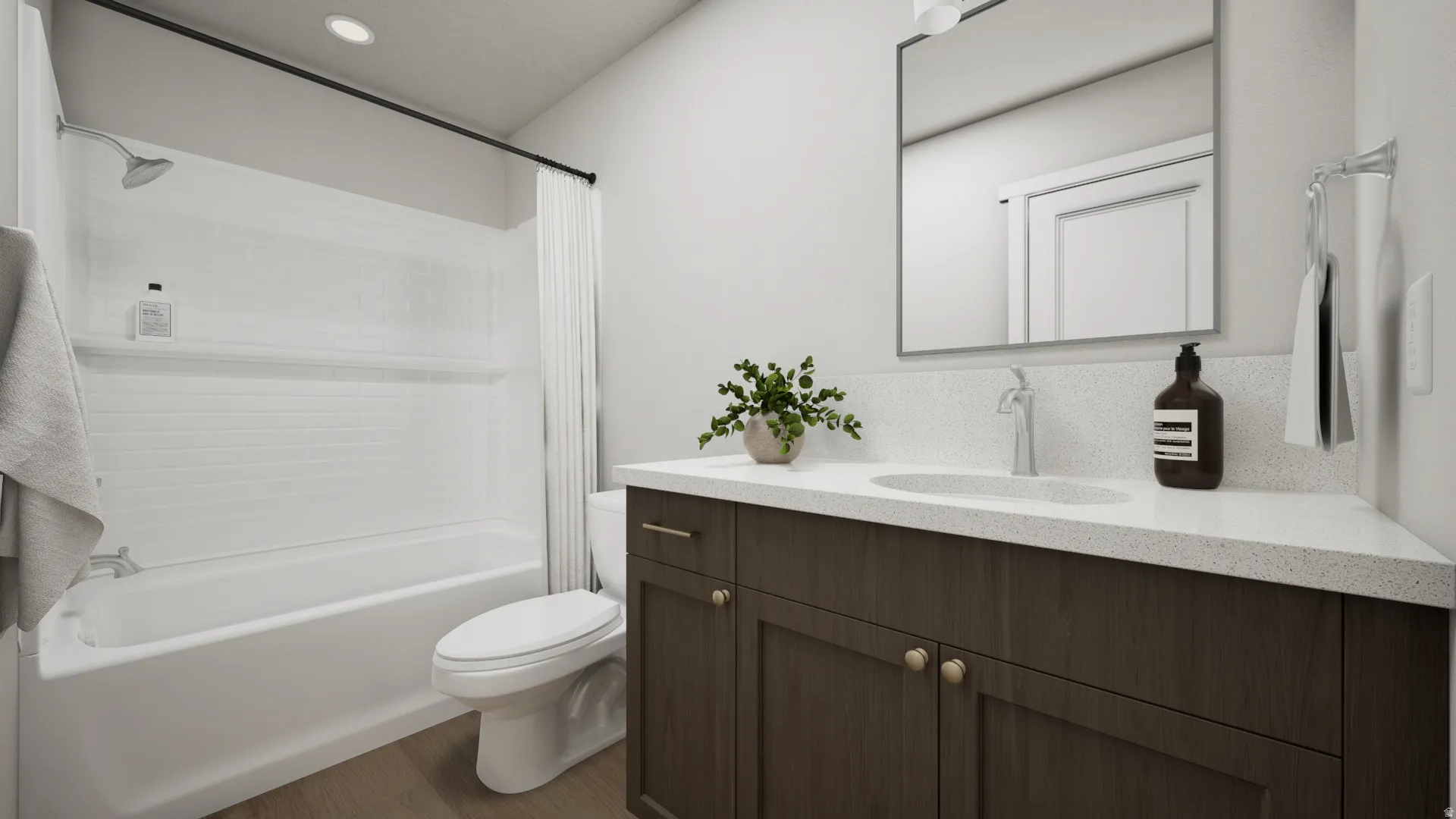 White bathtub and shower combination with subway tile surround, dark wood-finish vanity with a single basin, light speckled countertop, and a wall-mounted mirror