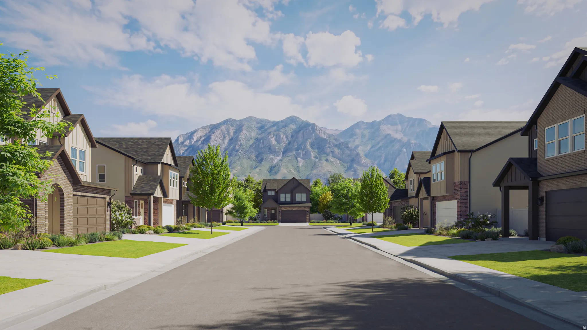 Tree-lined street with mountain backdrop