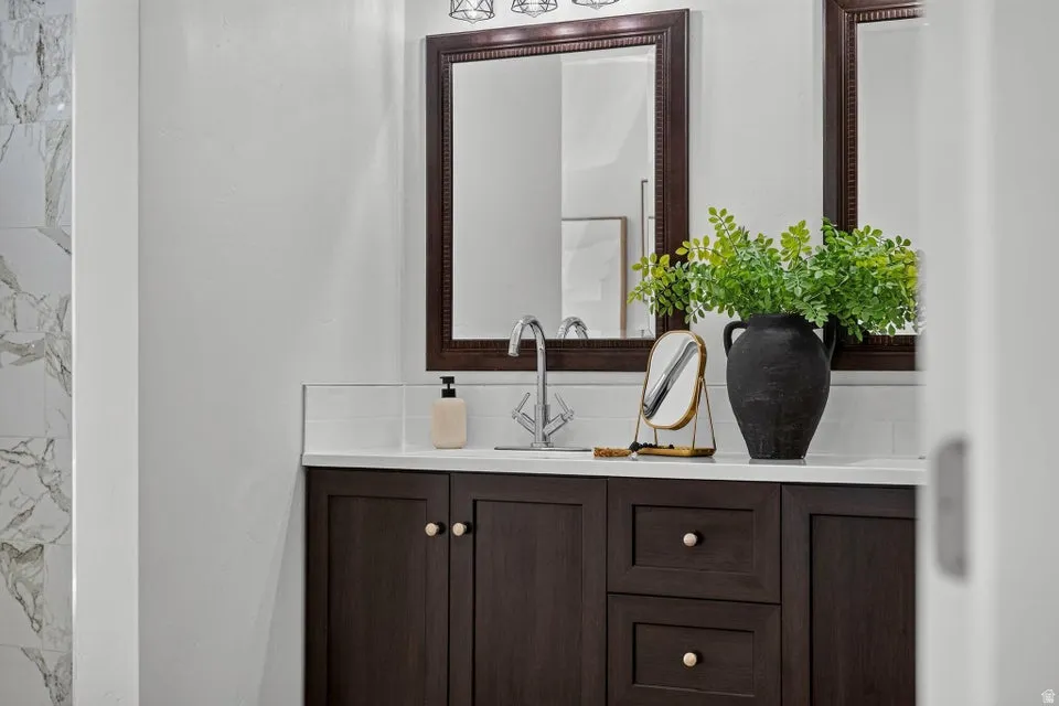 Dark wood-finish vanity with ample storage