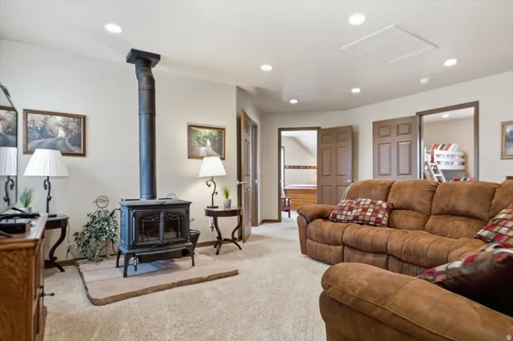 Integrated wood-burning stove with a stone hearth