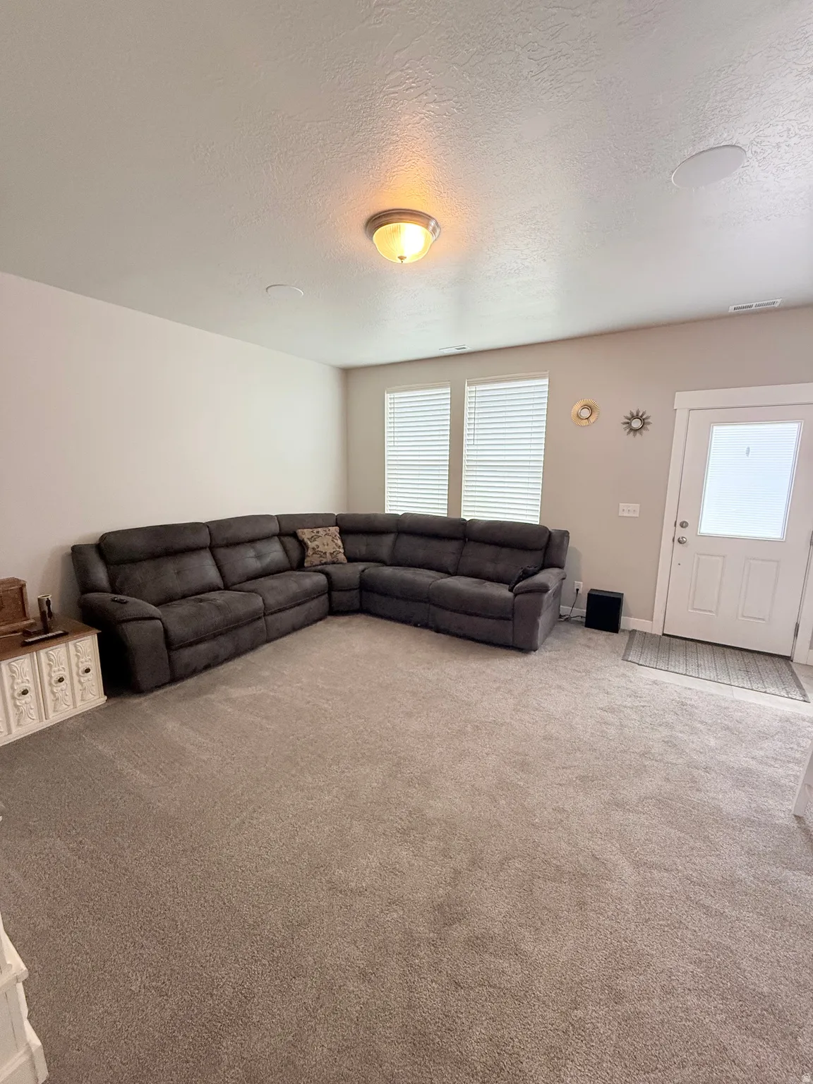 Recessed ceiling lighting, flush mount ceiling fixture, and twin windows with horizontal blinds