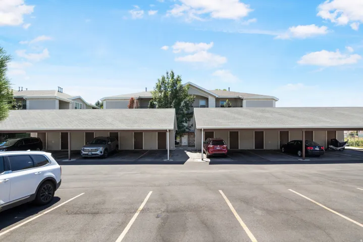 Dedicated covered parking spaces with asphalt paving