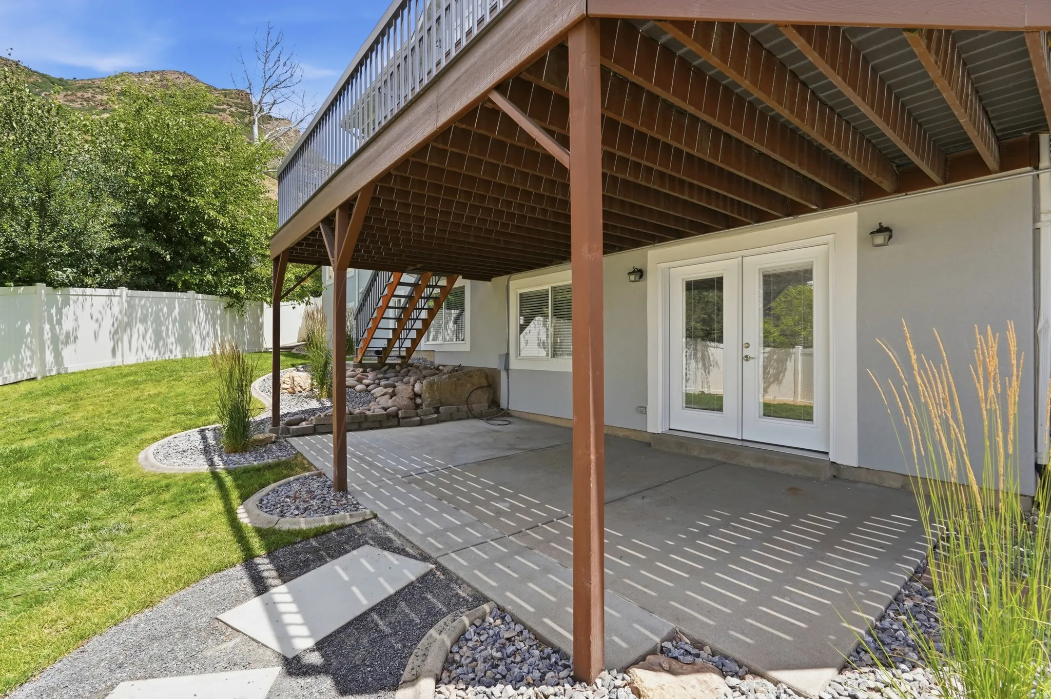 Expansive covered patio with concrete flooring
