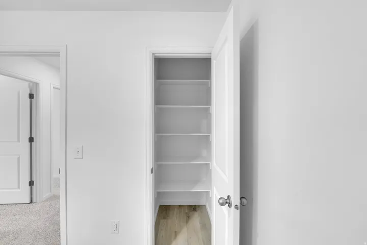 Built-in shelving with wood-finish flooring