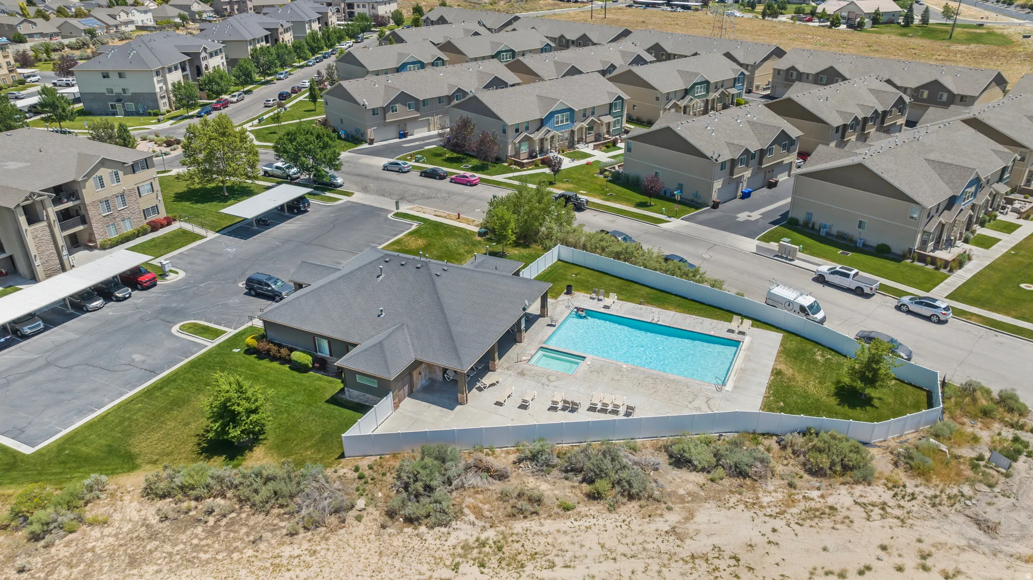 Community amenity building with an outdoor swimming pool and spa