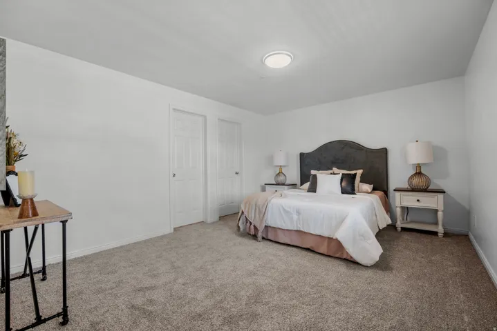 Neutral-toned carpeting throughout