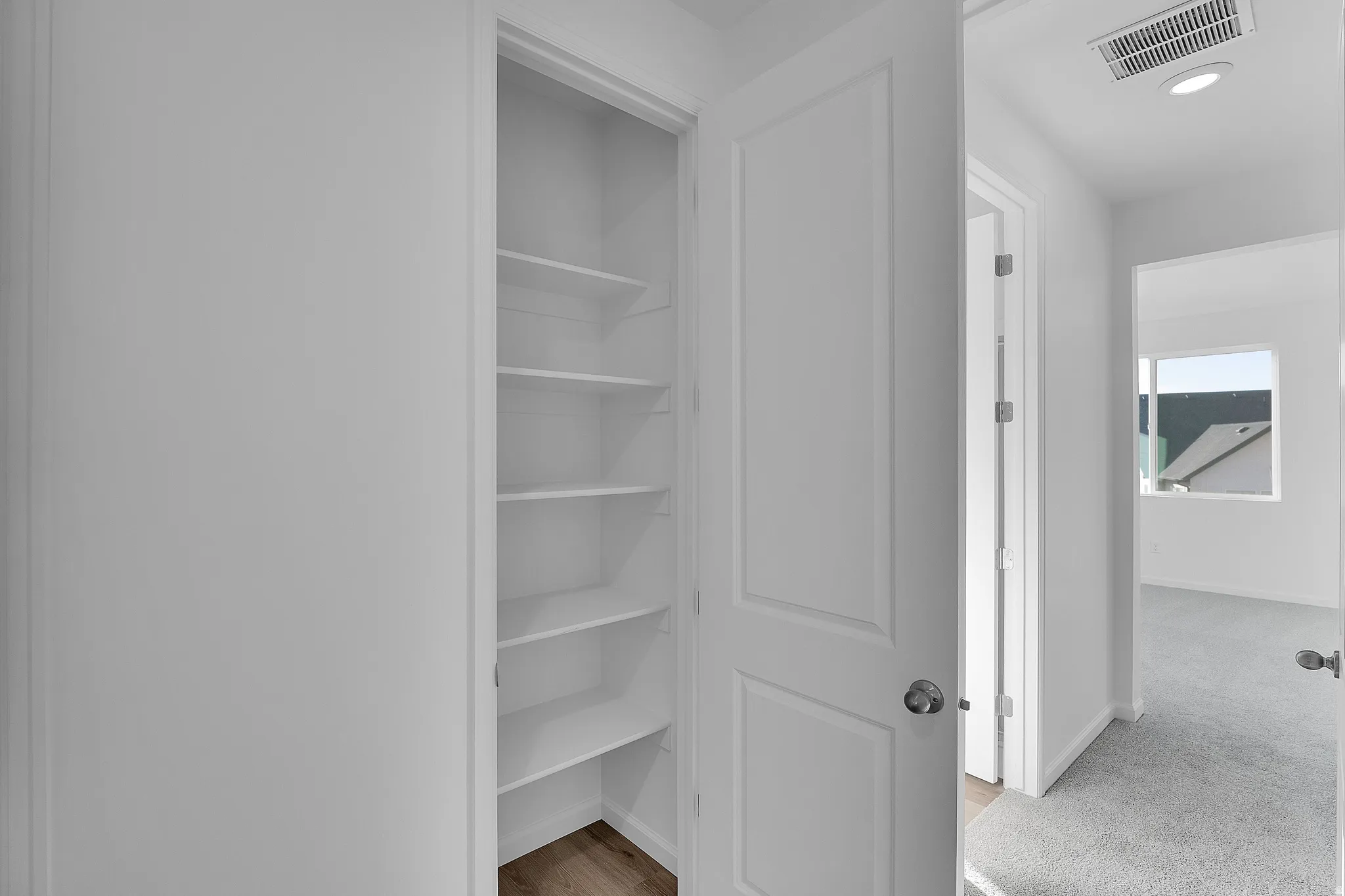 Built-in shelving with wood-finish flooring