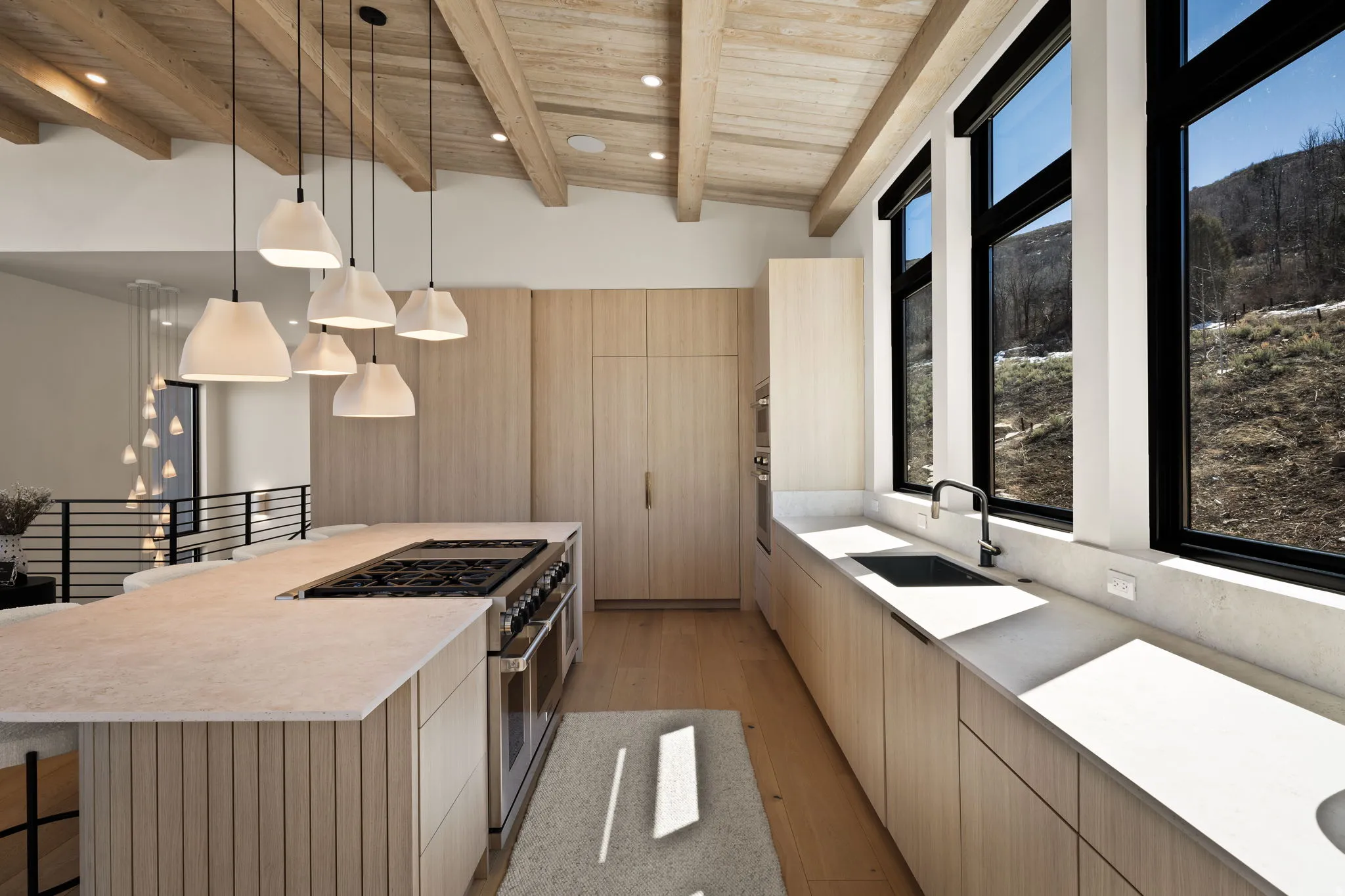 Vaulted wood-paneled ceiling with exposed beams