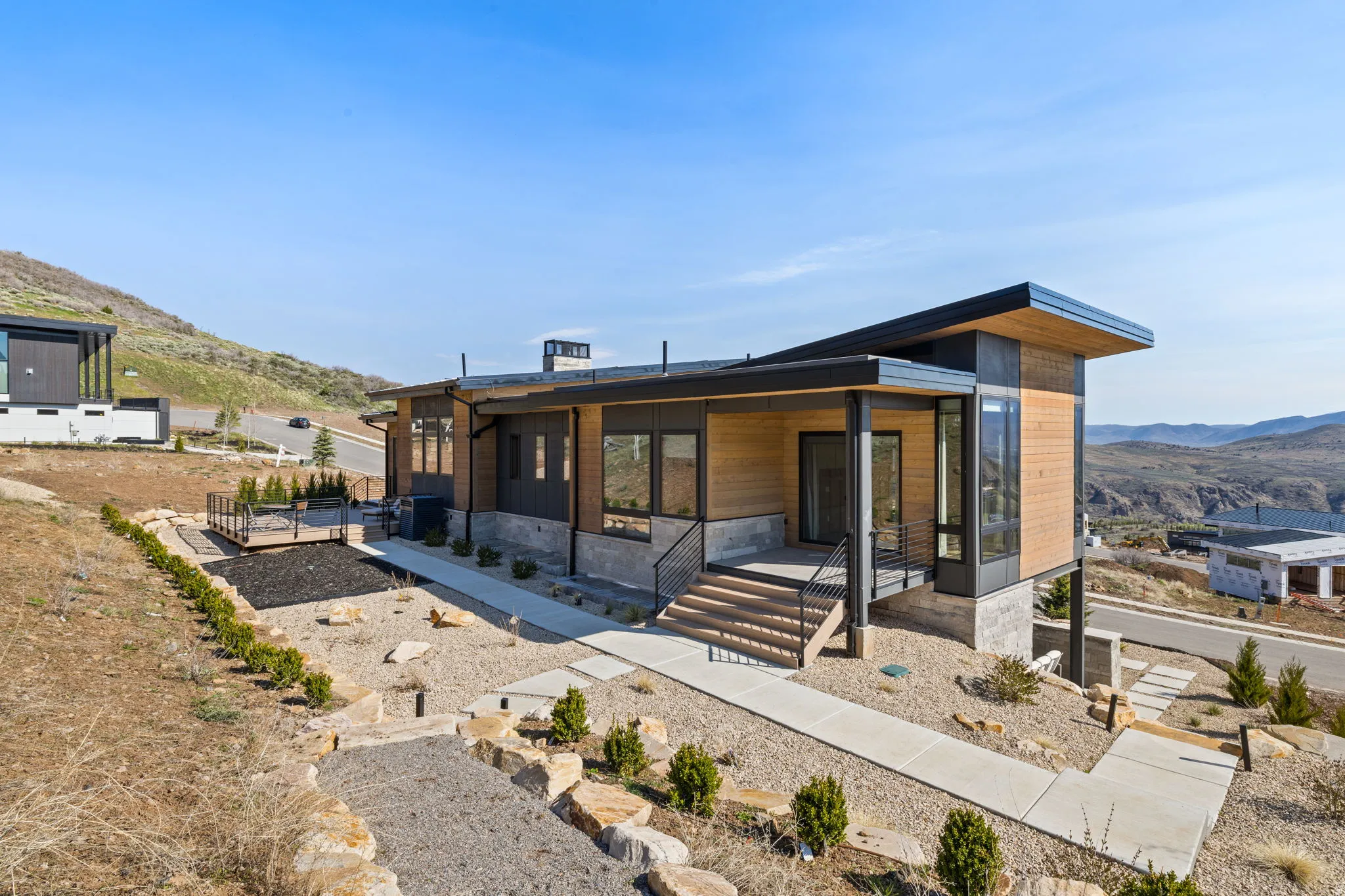 Modern architectural design with wood siding accents and large windows