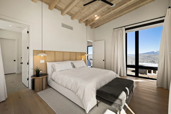 Vaulted wood-plank ceiling with exposed beams