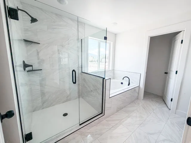 Walk-in shower with soaker tub