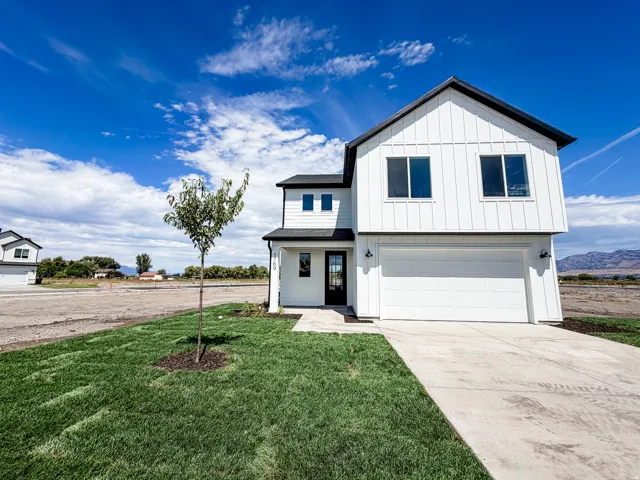 Front yard landscaping included with the home