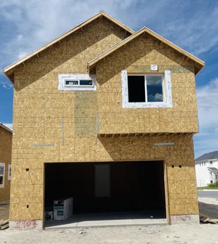 Rear view of Hemlock with two-car garage and driveway and full landscaping to be installed.