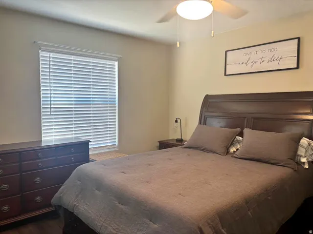Recessed window with white blinds and trim
