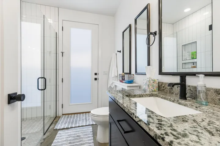 Main Floor Guest Bathroom with outdoor access