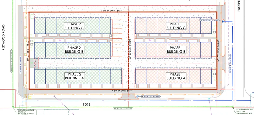 Site Plan. Illustrating the layout of buildings across two phases of development on the property