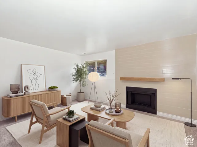 Built-in fireplace with a wood mantle, complemented by a horizontal panel accent wall