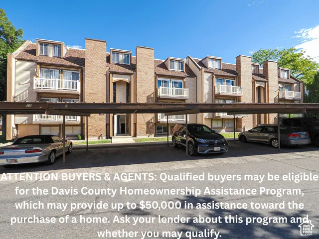 Real Estate Listing Photo. Exterior view of the property with a promotional overlay regarding a homeownership assistance program
