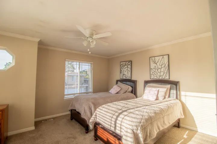 Neutral-toned walls with crown molding