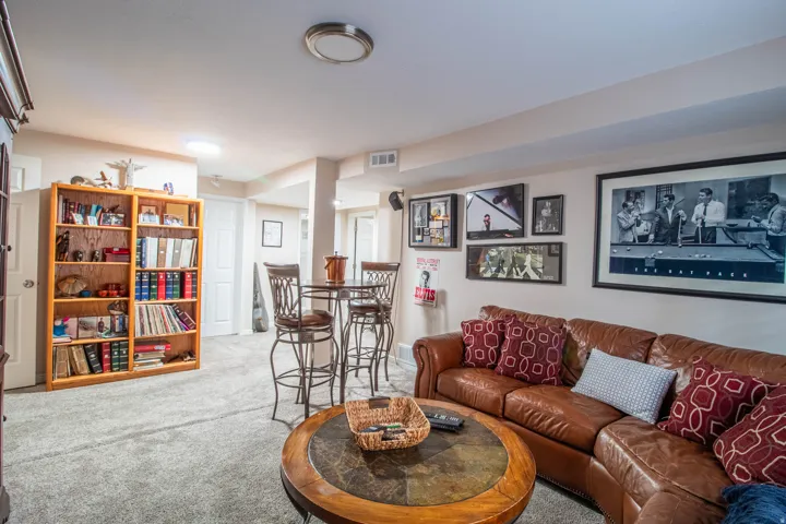 Wall-to-wall carpeting and neutral wall paint