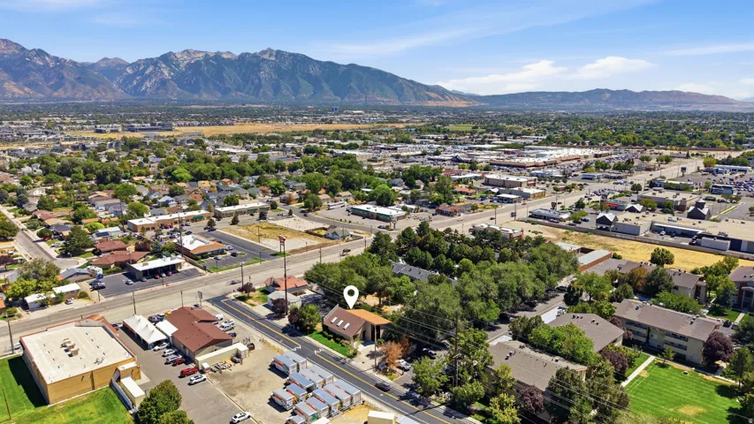 Mountainous terrain forms a prominent backdrop to the surrounding urban landscape