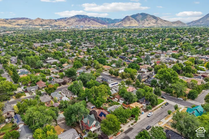 Expansive neighborhood featuring mature trees and established residential properties