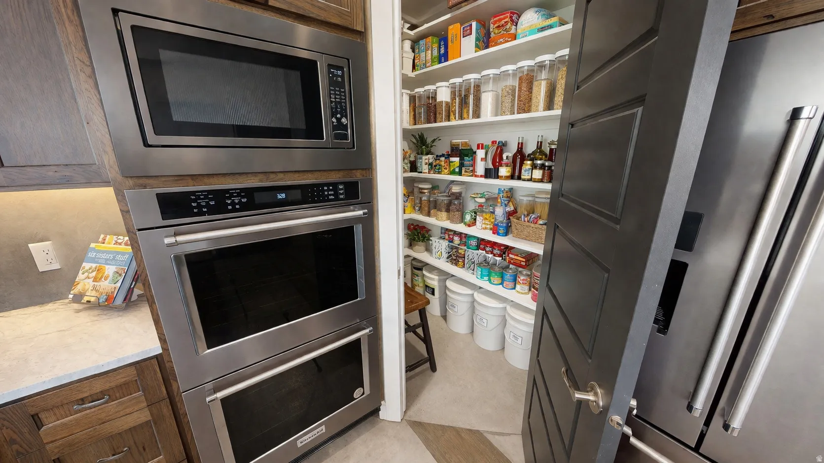 Stainless steel built-in microwave, double oven, and refrigerator