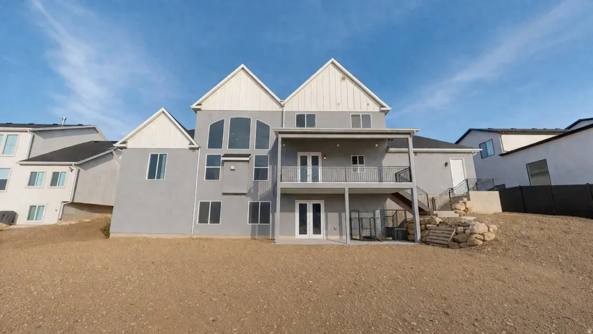 This is an Ai enhanced Photo. Contemporary exterior with multiple gabled sections and varied window configurations