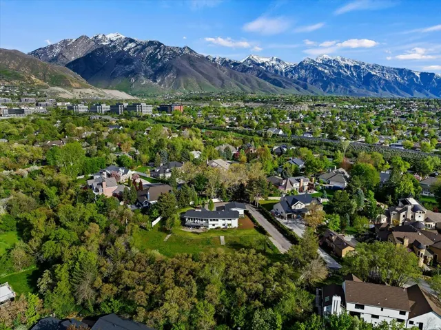 Aerial view showcasing the home’s Holladay location near the Wasatch Mountains and Big Cottonwood Canyon.