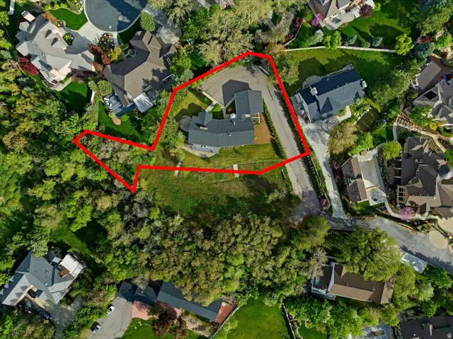Aerial view highlighting the .54-acre residence and adjacent .61-acre buildable lot, available separately or together.