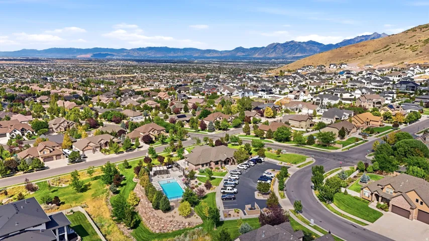 Expansive neighborhood with diverse residential architecture and mature landscaping